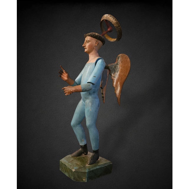 Rare early reticulated Mexican santos retaining the original wings and halo. Featuring a delicately carved face with glass...