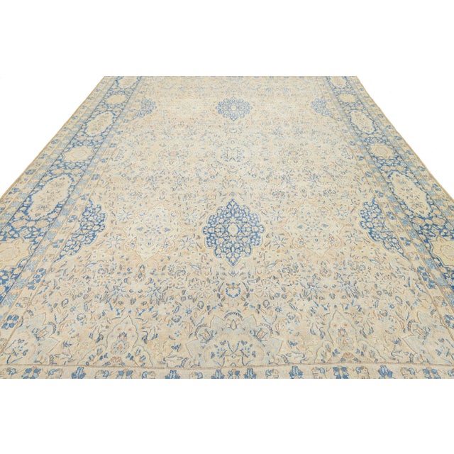 This exquisite Antique Kerman rug highlights the elegance of Southeast Persian weaving, featuring a refined color palette...