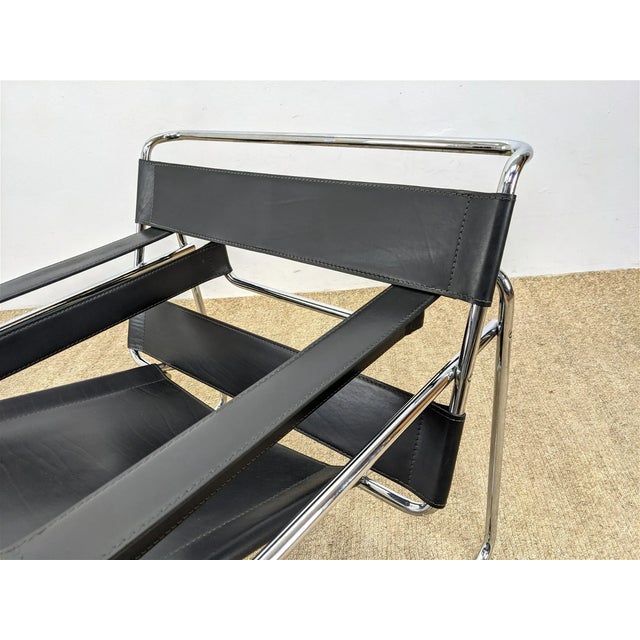 Pair MARCEL BREUER Wassily Black Leather Lounge Chairs. The Marcel Breuer Wassily Black Leather Lounge Chair, also known...