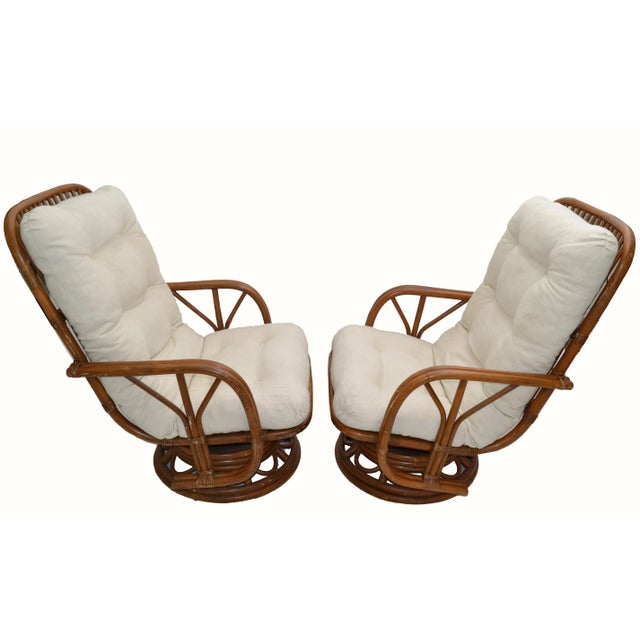 Pair of Mid-Century Modern handcrafted bamboo & wicker Lounge Chairs with Beige Linen Seat upholstery. Exemplary...