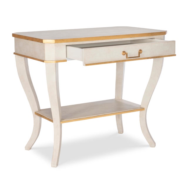 French white finished occasional table with antique gold leaf details and brass drawer pull.