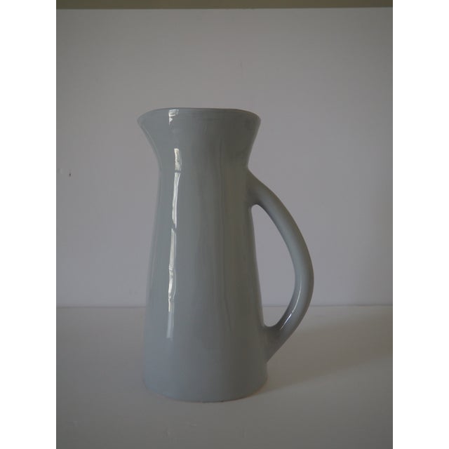 This pitcher from the Bria Hammel x etuHome Collection is a versatile home accent featuring a unique silhouette and sturdy...