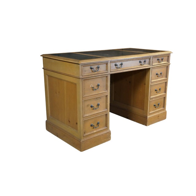 This classic Sligh pedestal desk seamlessly combines traditional craftsmanship with utilitarian elegance, constructed from...