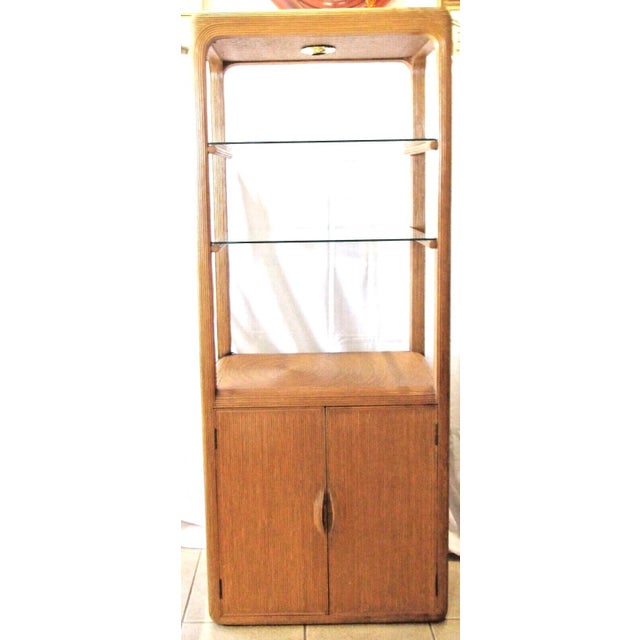 Matched Pair of Pencil Reed Etageres in the Style of Gabriella Crespi This pair of matching wall units each has two glass...