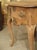 This charming oak console table was hand carved in the Netherlands during the 1700’s. The shaped top has quarter round...