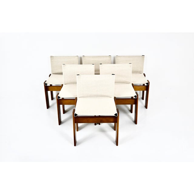 Set of six canvas and wood chairs by Afra and Tobia Scarpa. Model: Monk. Seat height: 45 cm. The chairs show signs of wear...