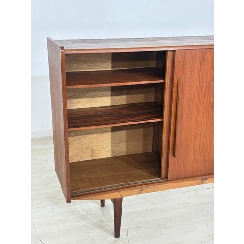 For sale is a beautiful vintage highboard in Danish design. The piece is crafted from high-quality teak and is in good,...