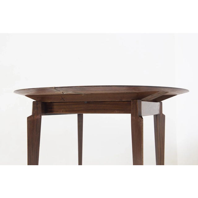Beautiful 1950s round table of Italian manufacture Dassi designed by Edmundo Palutari. The table is entirely made of a...
