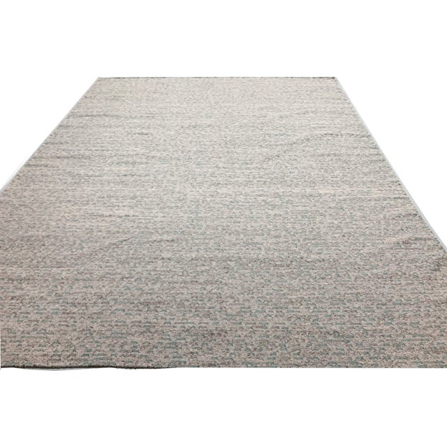 Handwoven in India, this Kilim takes inspiration from the clean and simple aesthetics of Swedish designs. Its blend of...