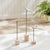 A modern, abstract rendition of birds sits atop basic wood pedestals. A handcrafted rustic set that is worthy of study,...