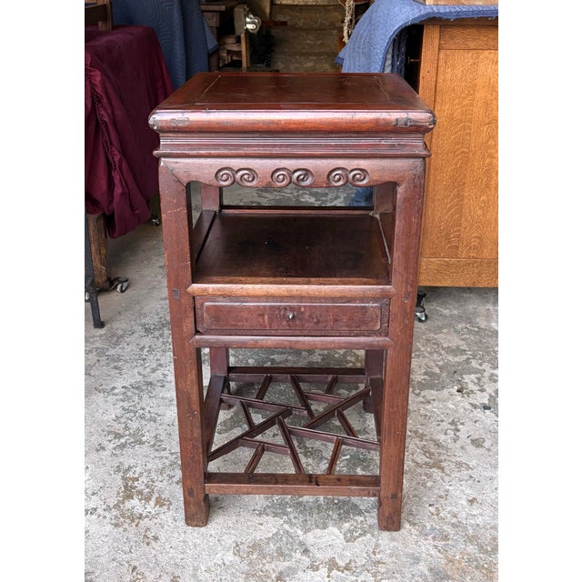 Nice old Chinese table with drawer and shelf. Appears to be made of a few different woods.