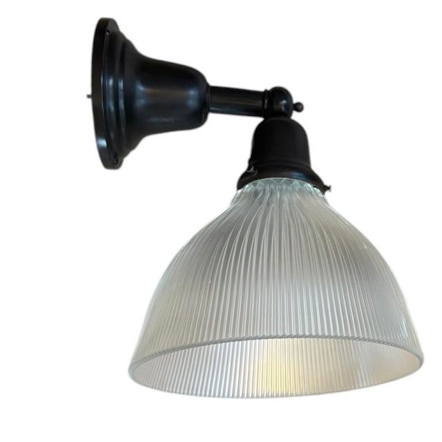 This pair of rare holophane wall sconces will look great with any style of architecture, even modern. They are perfect for...