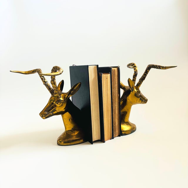 A pair of vintage brass bookends in the shape of gazelles. Beautiful gold coloring to the brass. Nice larger size with...