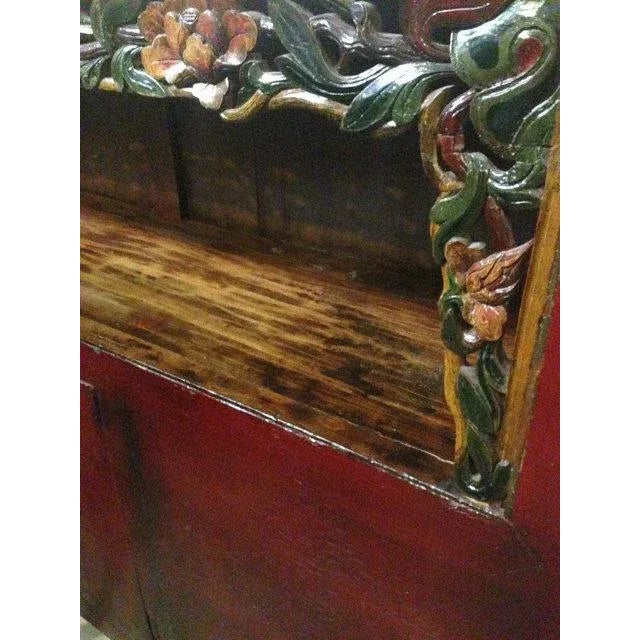 This beautiful cabinet features an open light shelf that balances the otherwise heavy chest with an airy light feel....