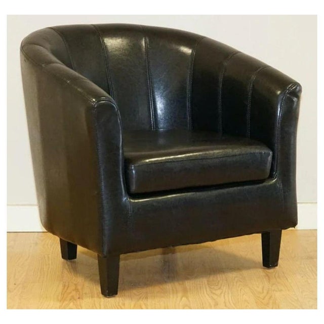 Lovely black faux leather tub chair. A great chair to add to your office, workspace, kids' bedroom or anywhere you know it...