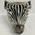 Beautiful Boho Chic ceramic cachepot of a zebra. Great addition to your Boho Chic modern interiors and garden. We have a...