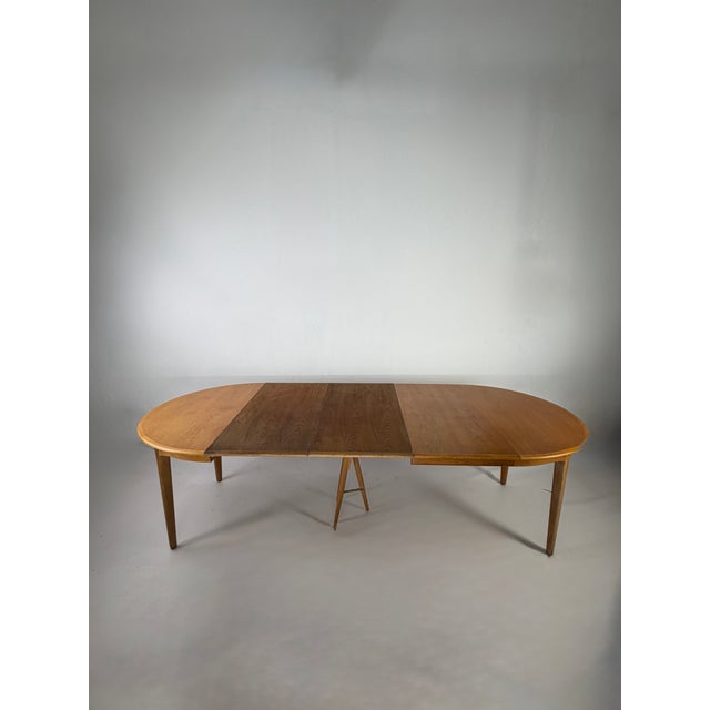 Danish Modern Extendable Oak Dining Table by Henning Kjærnulf for Sorø Stolefabrik, 1960s, in Very Good conditions....