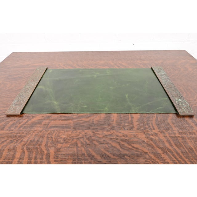 A gorgeous pair of Art Deco or Arts & Crafts period patinated bronze blotter ends featuring symbols of the Zodiac with a...