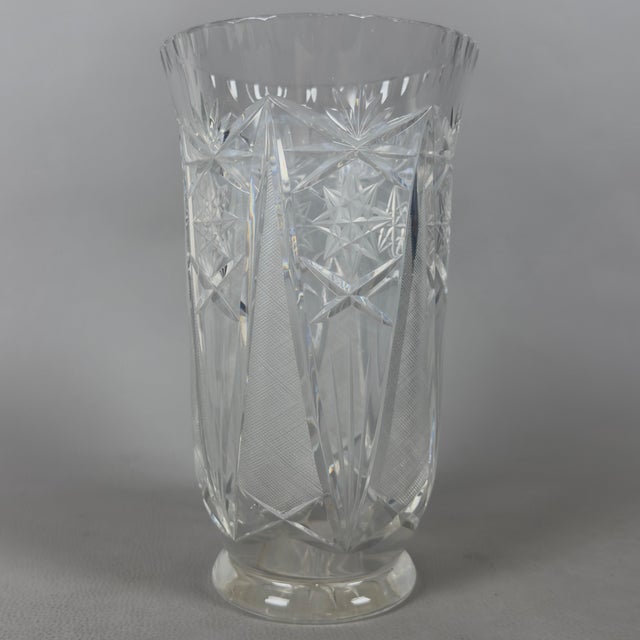 A superb and massive decorative piece, a pure expression of fine European glassmaking. This rare vase in heavy Bohemian...