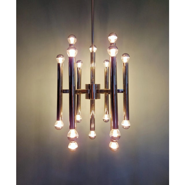 Large space age chandelier in tubular chrome metal, designed by gaetano sciolari, produced by the belgian manufacturer...