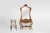 An elegant French console mirror from the 1970s, crafted in carved and gilded wood in the Louis XV style with Baroque...