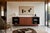 Mid-century walnut credenza manufactured in the United States, circa 1960s. This beautifully executed case piece...