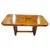 A handsome British Art Deco dining table dating to circa 1930, beautifully crafted in richly figured walnut and...