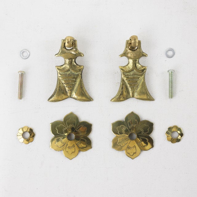 This unique pair of vintage brass cabinet drop pulls features a finely detailed five-petal blossom backplate paired with a...