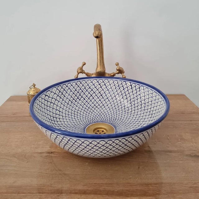 ZERKA' Blue Sink Bowl, finished basin features the delicate pale Blue colour and crackle glaze finish often seen in...