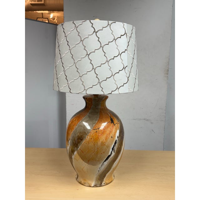 Design Plus Gallery presents an Amber Glass Table Lamp. The large lamp is a nice bulbous bodied shape with a narrow neck....