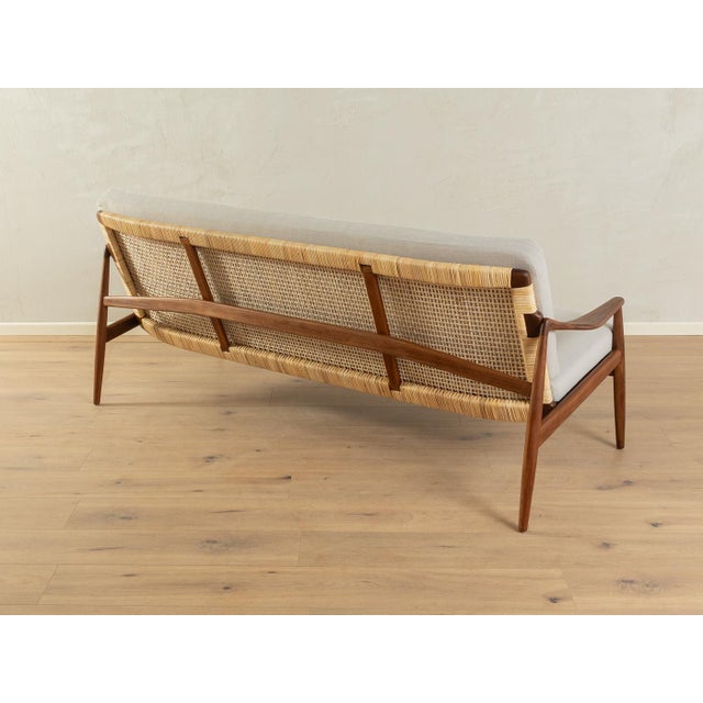 Exclusive Type-400 sofa from the 1950s by Hartmut Lohmeyer for Wilkhahn. High-quality teak frame with new, contemporary...