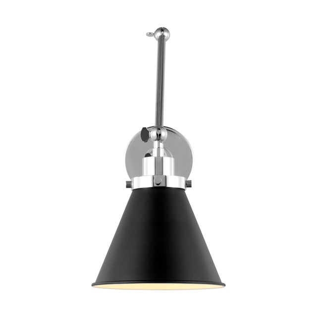 Inspired by various classic utility silhouettes - from factory lighting to barn sconces - capped by contrasting metal...