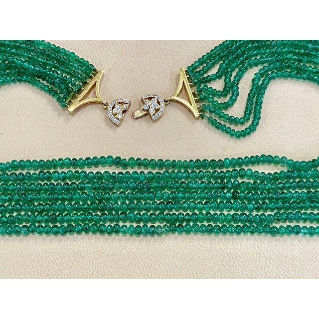 200 Carat Emerald Beads 7 Line Necklace With Diamond Clasp 18 Kt Yellow Gold This spectacular Necklace consisting of...