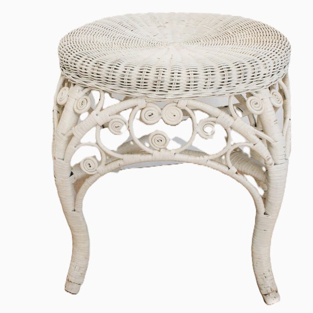 1960's round rattan footstool, this stylish footstool can be used with a cushion in your favorite color pallet. Or for a...