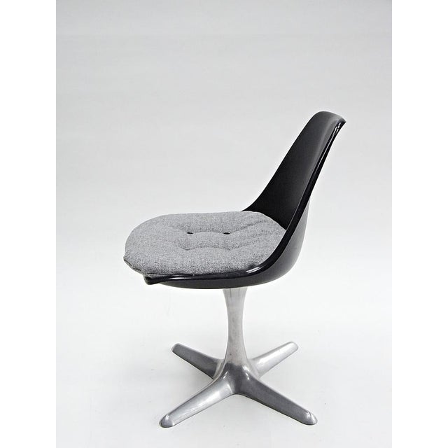 Arkana Shell Chair in Fibreglass with Cushion by Maurice Burke, in Good conditions. Designed 1970 to 1979 This piece has...