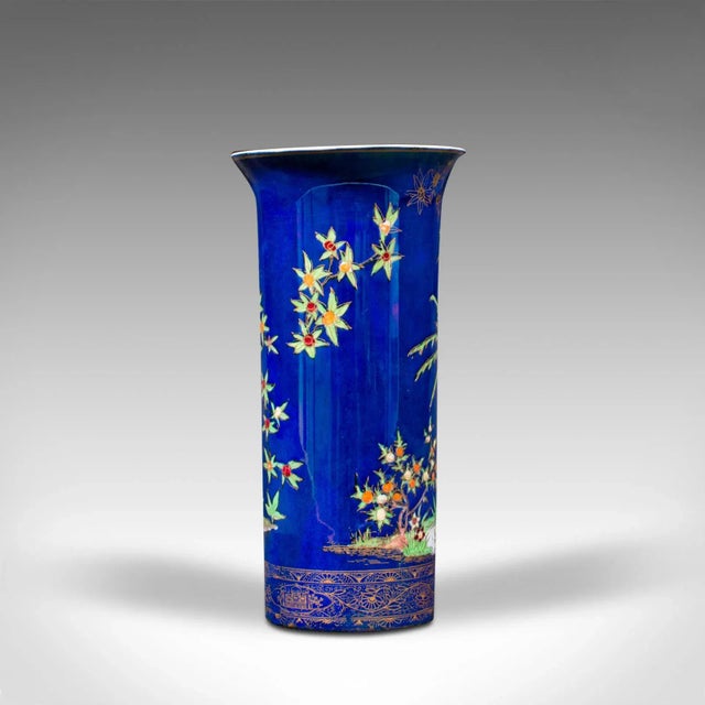 This is an antique decorative vase. An English, ceramic and lustre finish posy jar, dating to the early 20th century,...