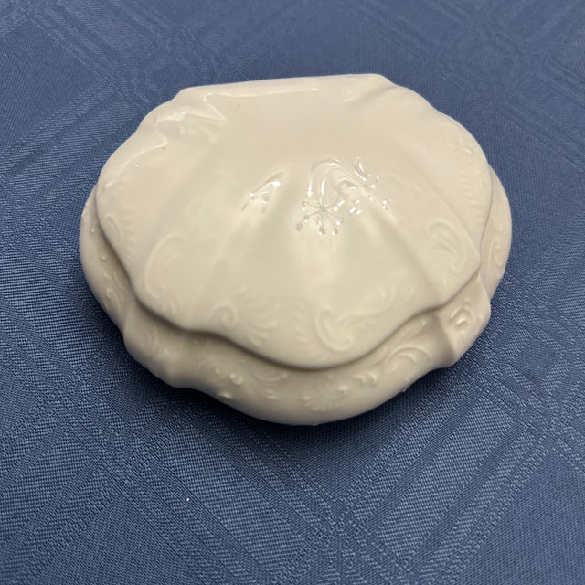 Beautiful Scalloped edge with Vine & Ribbon Accents Limoges Trinket Box made in France. Take advantage of this rare design...