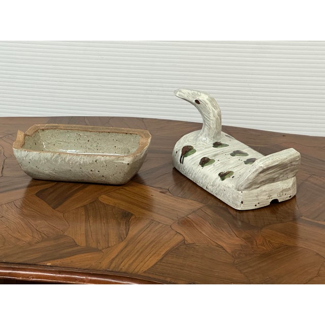 Design Plus Gallery presents a Vintage Ceramic Bird-Shaped Lidded Box. This sculptural vessel takes the form of a stylized...