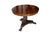 A striking antique pedestal center table dating to the early 19th century, featuring richly toned wood, decorative brass...