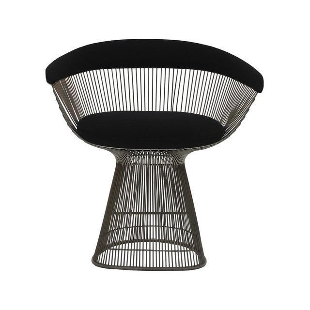 Set of 4 chairs designed by warren platner between 1968 and 1970, featuring a chrome-plated steel structure and dark wool...