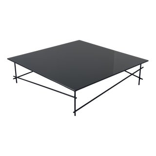 Minimalist Black Glass Coffee Table with Industrial Metal Base For Sale