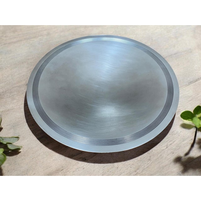 Impressive silver-plated fruit bowl/centerpiece by Christofle Base composed of light wood and silver-plated metal circles...