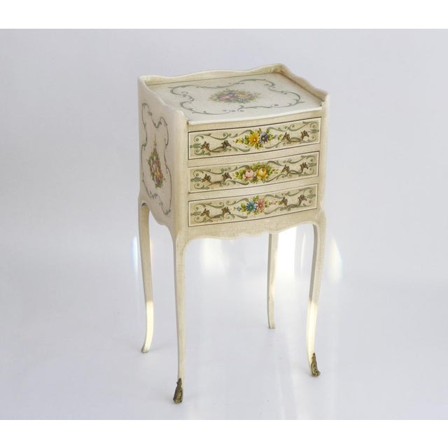 Antique Venetian chest of drawers with hand painted floral details all over in white/beige color. The side table has 3...