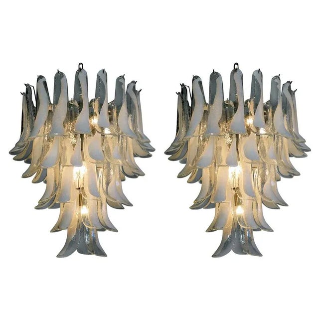 Huge Italian vintage Murano chandelier made by 52 glass petals (transparent and white “lattimo”) in a chrome. Period:...