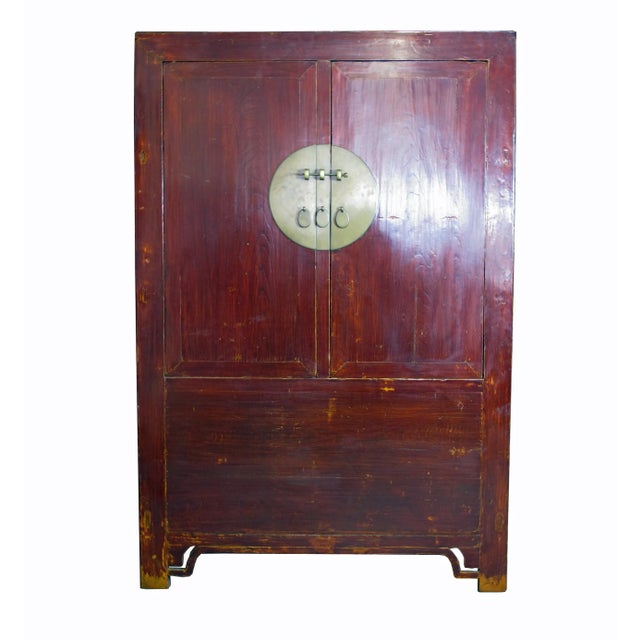 Constructed entirely solid elm. A clear coating of protective finish brings out rich mahogany tone, wood grain, and nicely...