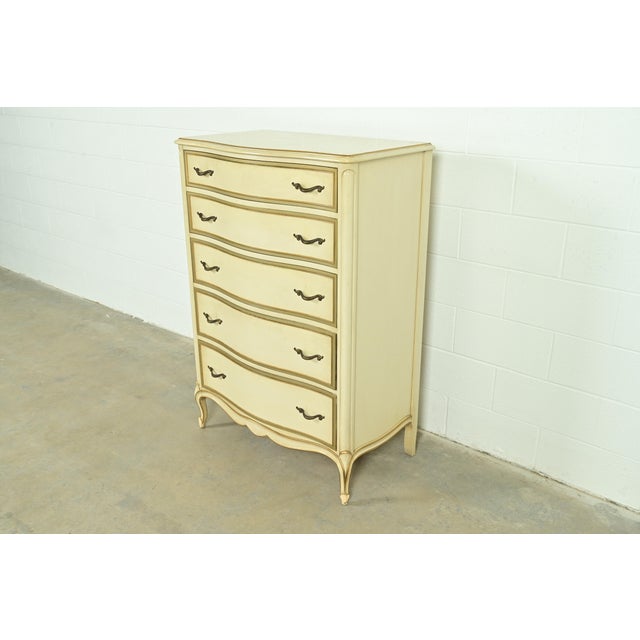 A gorgeous French Provincial Louis XV style highboy dresser By Drexel USA, 1956 Carved cream lacquered walnut, with olive...