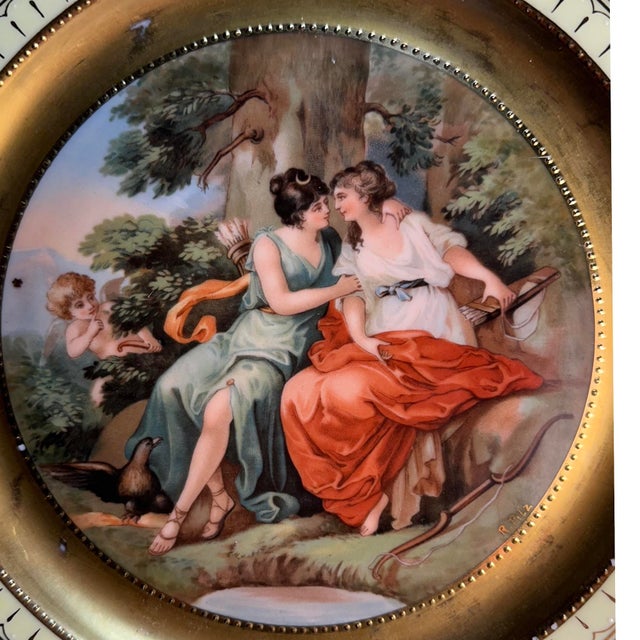 This Royal Vienna-style cabinet plate depicts the myth of Jupiter and Calisto. Jupiter disguises himself as Diana, goddess...