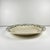 Round "Champagne" dish, Badonviller, green, early 20th century. Semi-porcelain Dimensions: Diameter: 31 cm Height: 4 cm...