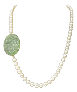 Late 20th Century 18k Yellow Gold Framed Jadeite Pendant With Dragon Motif Attached at the Sides to 23.5" White Pearls
