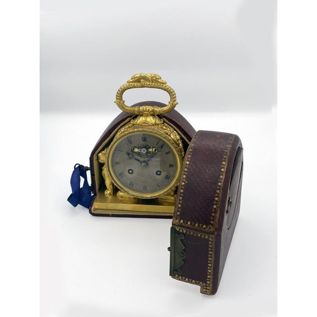 A rare and refined French travel watch, a similar example of which was sold at a major Swiss auction. The case is crafted...